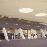 Luxury Modern Structural Light Steel Structure Prefabricated Exhibition Hall Building Design Warehouse 4S Car Showroom Garage