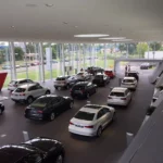 Luxury Modern Structural Light Steel Structure Prefabricated Exhibition Hall Building Design Warehouse 4S Car Showroom Garage