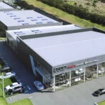 Luxury Modern Structural Light Steel Structure Prefabricated Exhibition Hall Building Design Warehouse 4S Car Showroom Garage
