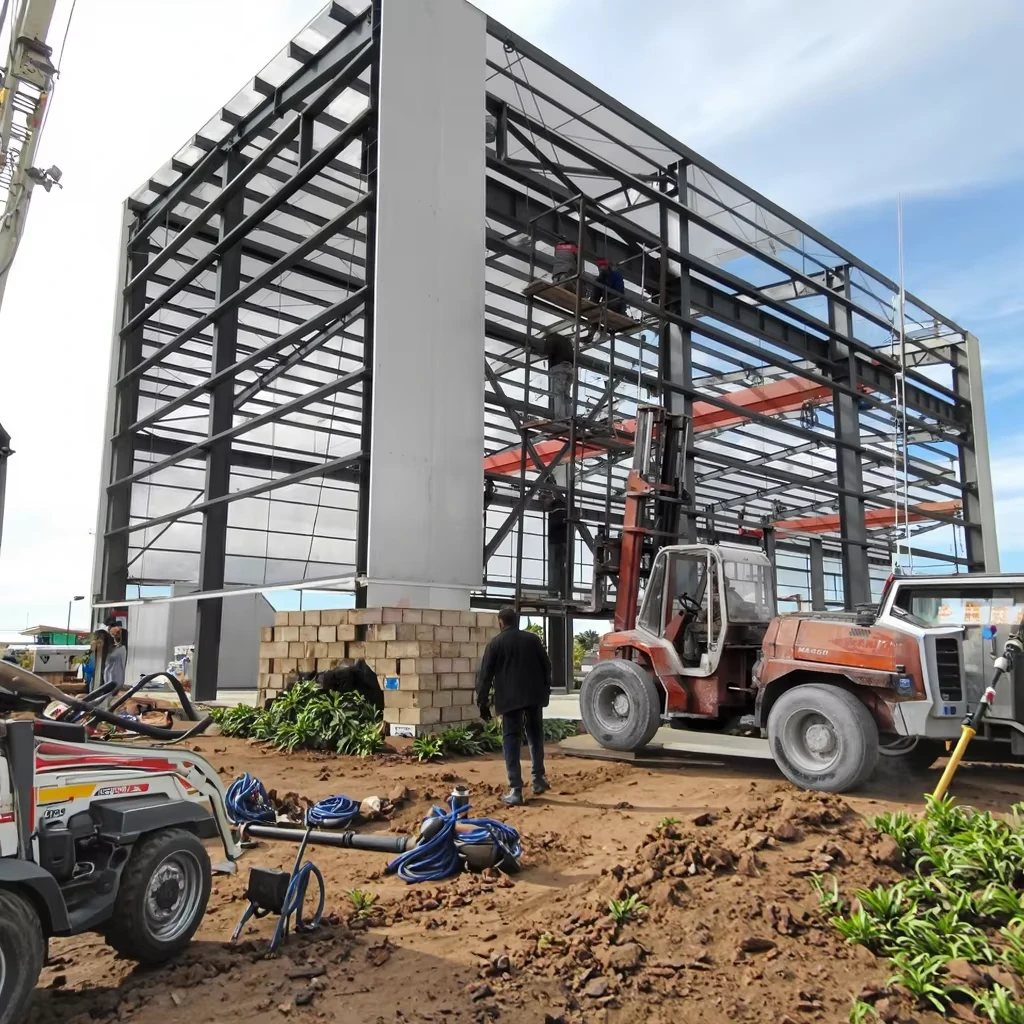 product_image_1777389858 Hot Selling Prefab Steel Carport Public Steel Structure Frame Garage with Framework for Garage Storage Warehouse