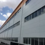TV Factory Prefab Steel Structure Construction Warehouse Prefabricated Workshop Industrial Shed Free Design Glass Curtain Wall
