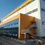 TV Factory Prefab Steel Structure Construction Warehouse Prefabricated Workshop Industrial Shed Free Design Glass Curtain Wall