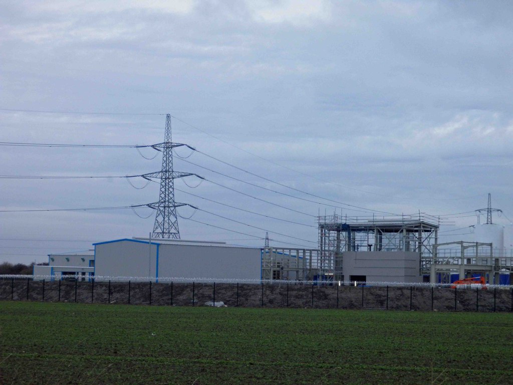 Steel workshop building under construction at a cold-climate industrial estate in Canada