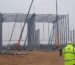 High-bay steel workshop frame erection with mobile cranes in Vietnam