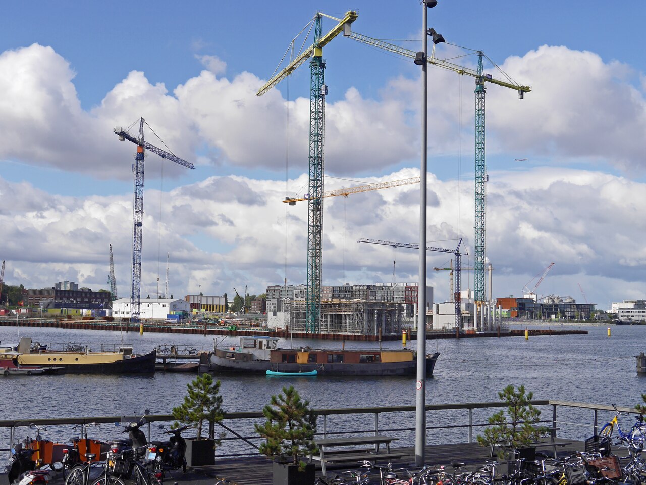 construction crane lifting steel - illustrative