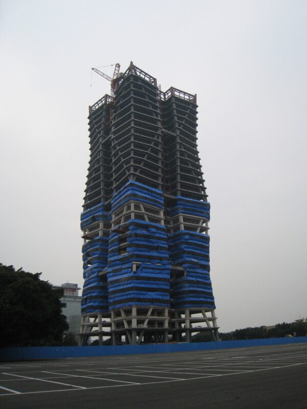 Steel building fabrication workshop with portal frames - illustrative